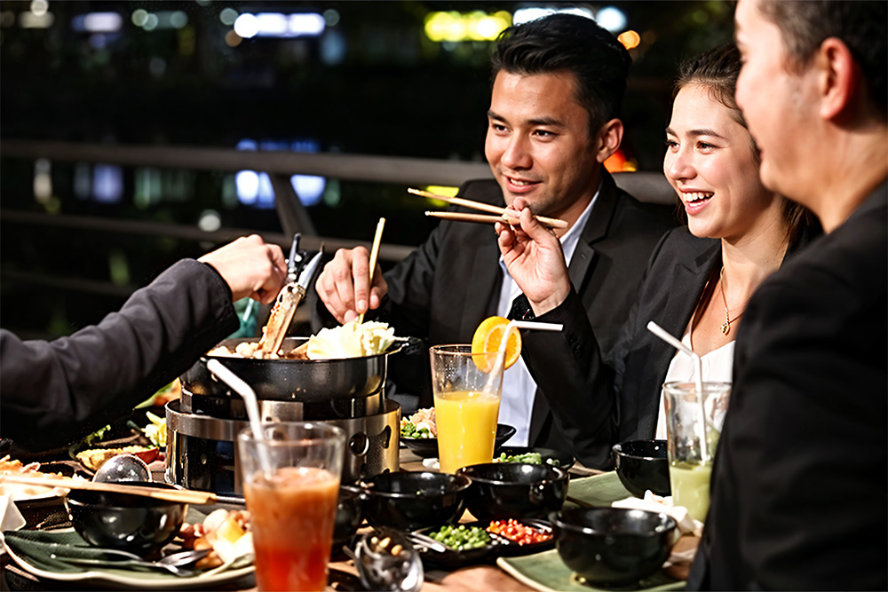 A group of friends having dinner at Little Bangkok Restaurant