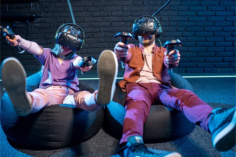 Friends playing virtual reality games