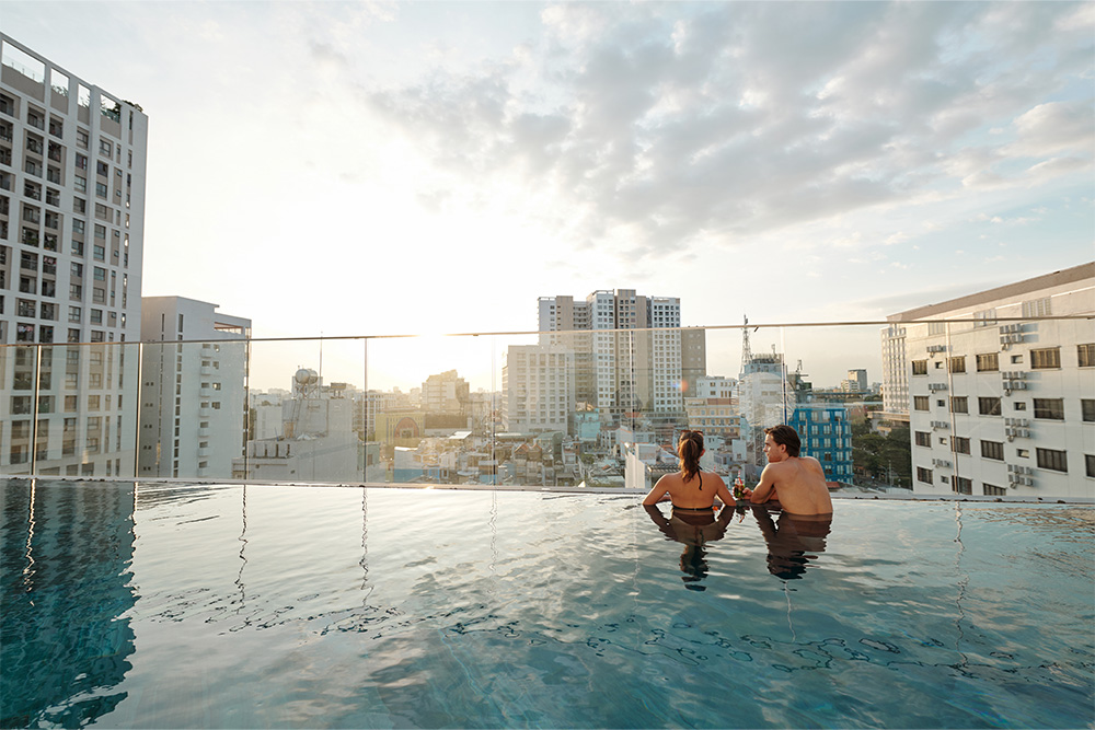 relaxing in rooftop pool in Al Barsha hotel