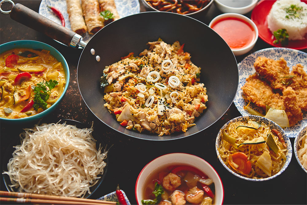 A table full of food at an Asian Restaurant Sharjah