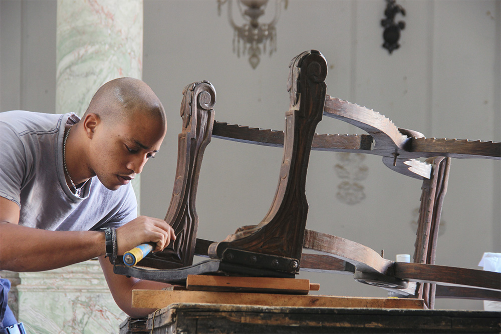 Antique furniture being restored in a store 