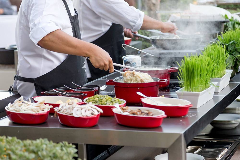 Live cooking station at a rooftop restaurant 