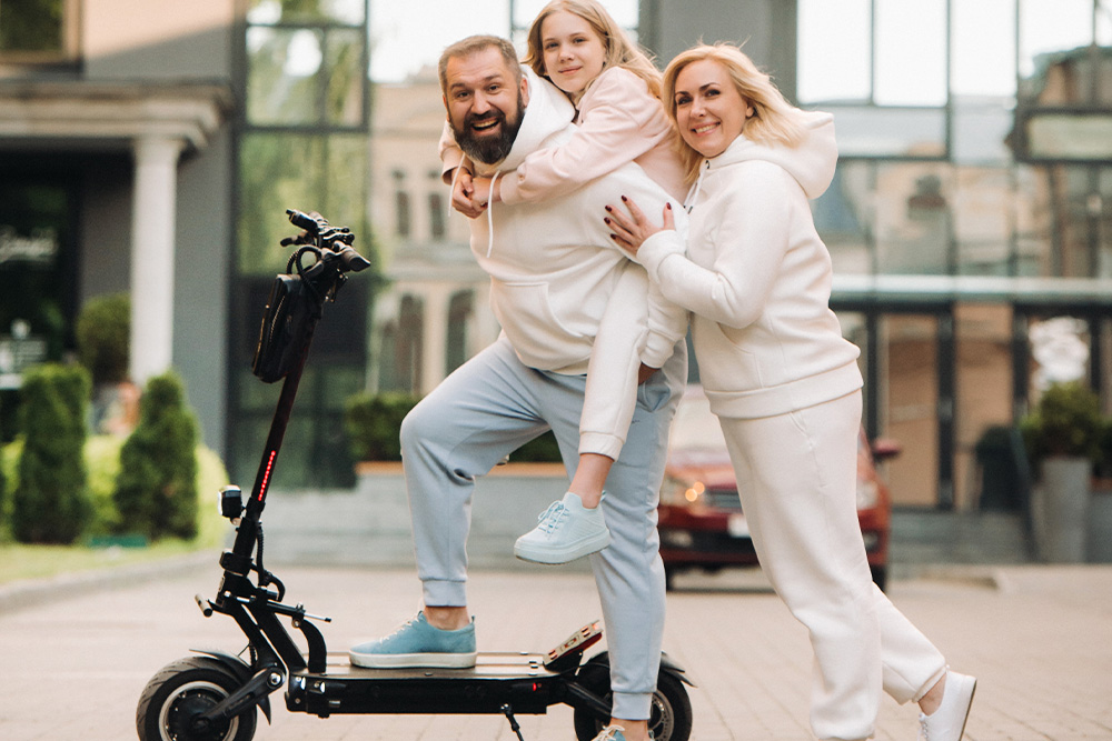 Family outside their apartment building