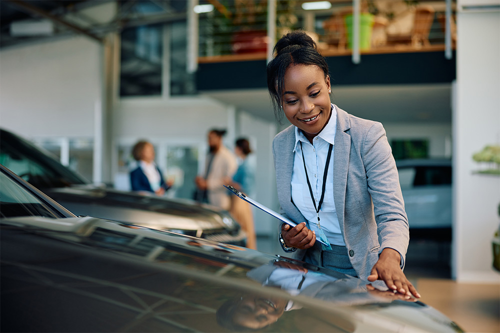 Woman Inspecting Car