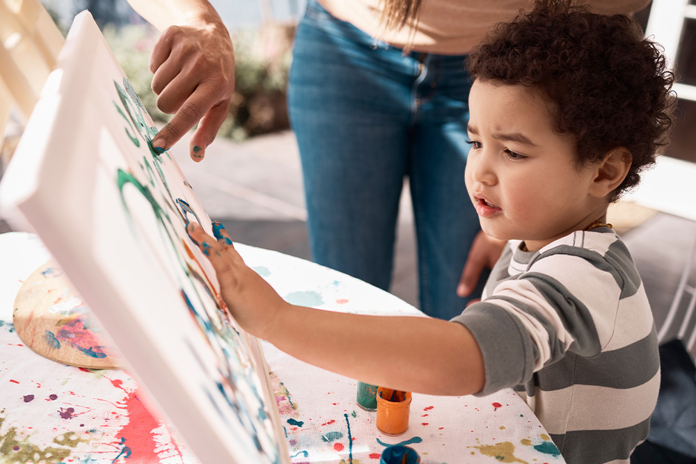 A kid learning painting in Dubai