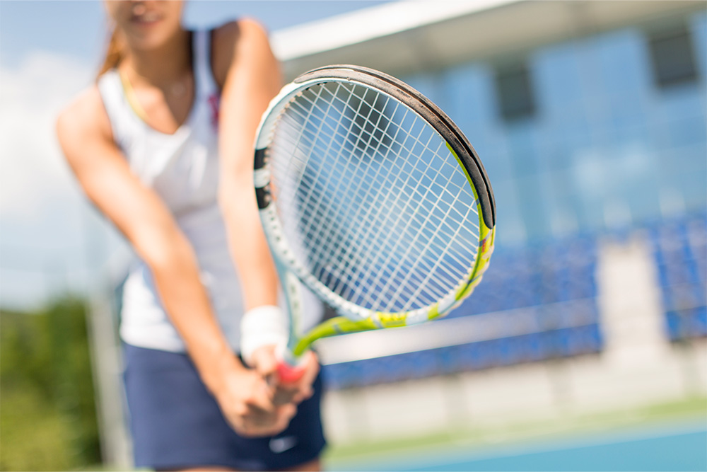 playing tennis in Dubai academy