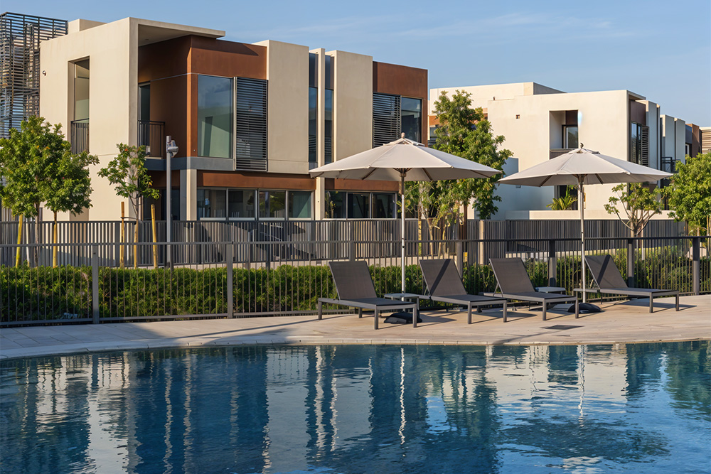 Pool front image with beach chairs 