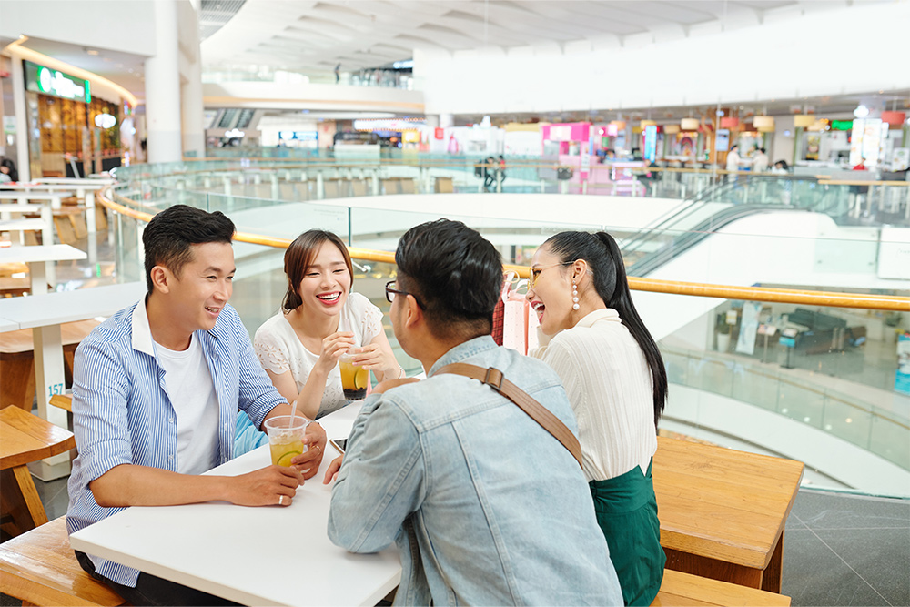 Friends at the dining area in Al Hudaiba mall