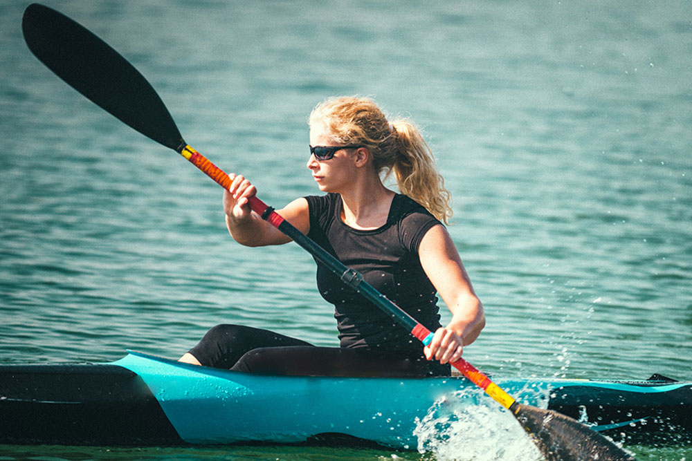 kayaker training on a lake 