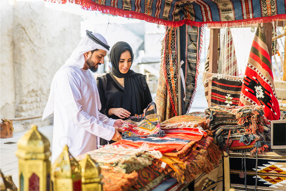 Arabian Couple shopping at Souq Ramadan