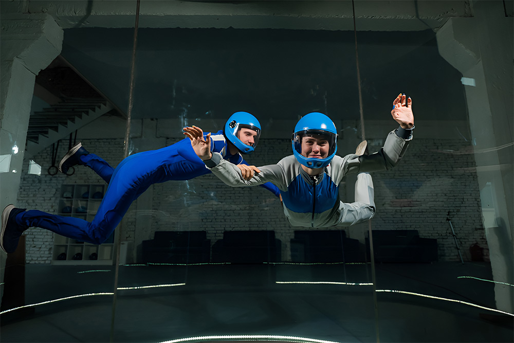 Employees flying as a team at iFLY Dubai