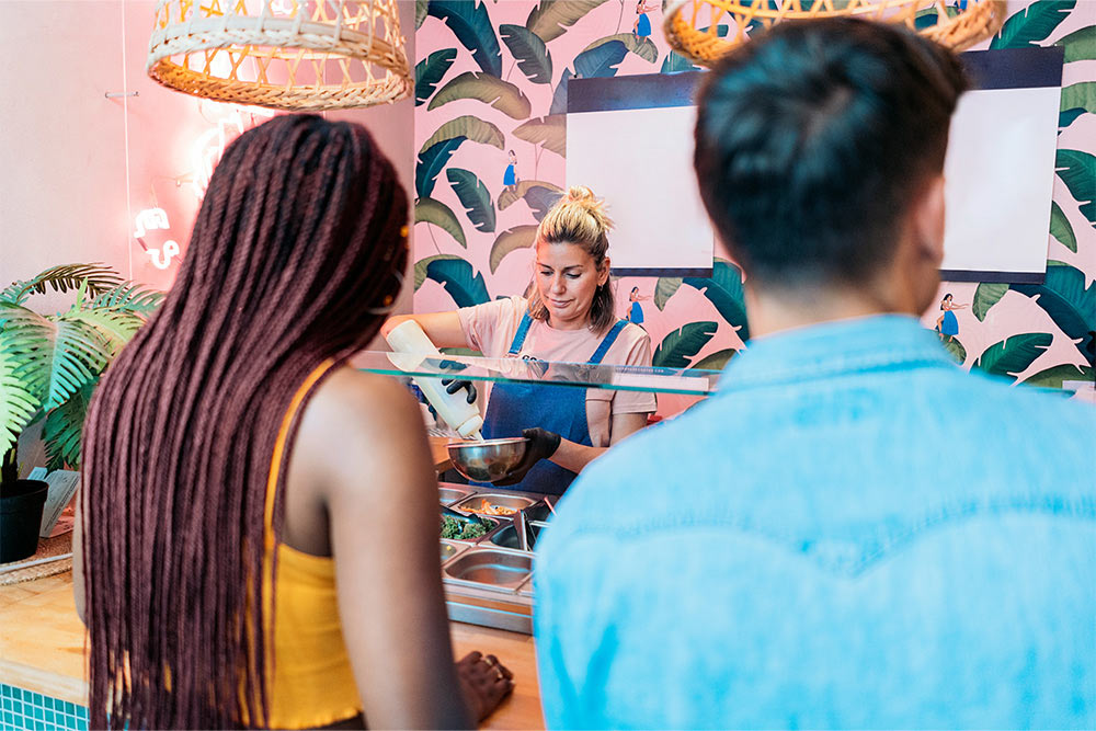 Customers waiting for Acai Bowl at a Brazilian restaurant Abu Dhabi​ 