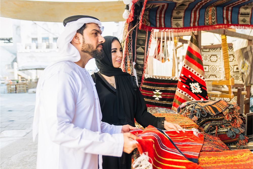 A coupe shopping in Global Village