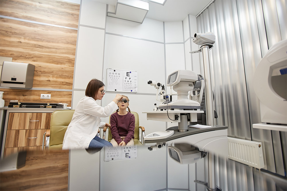 A vision test of a girl in an eye clinic in Sharjah 