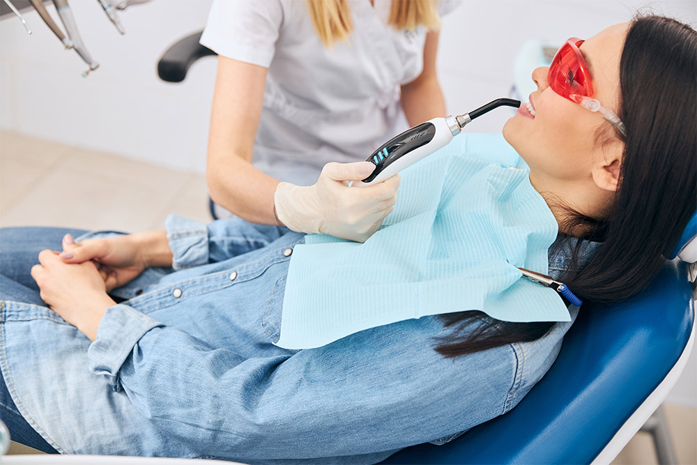 A woman undergoing dental treatment at Dr Joy Dental Clinic 