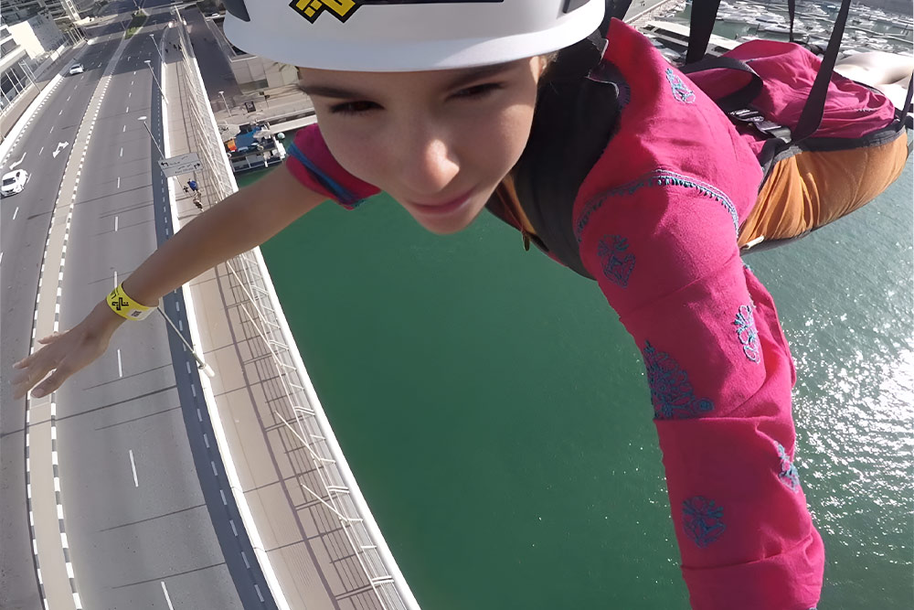 A girl enjoying a zipline experience at XLine Dubai Marina