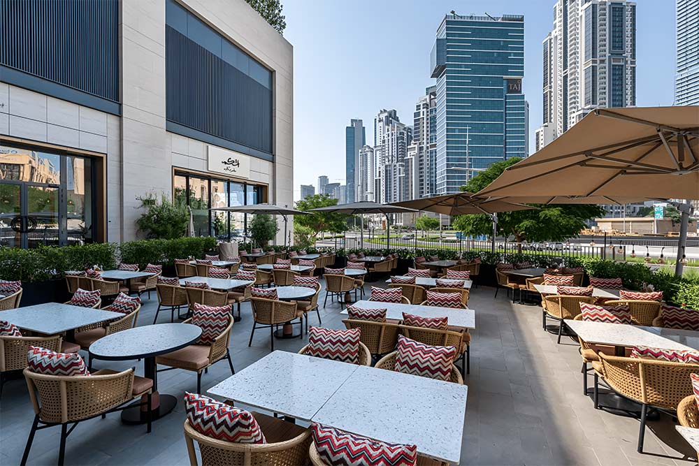 Outdoor seating space of Askim restaurant in Dubai