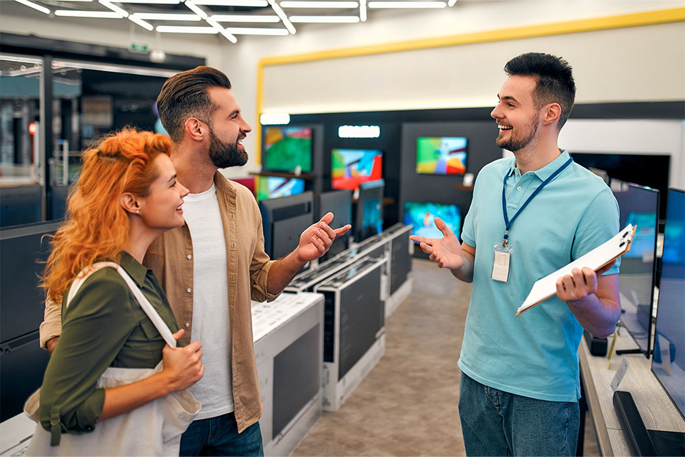 A couple shopping for household appliances at Day to Day Ajman