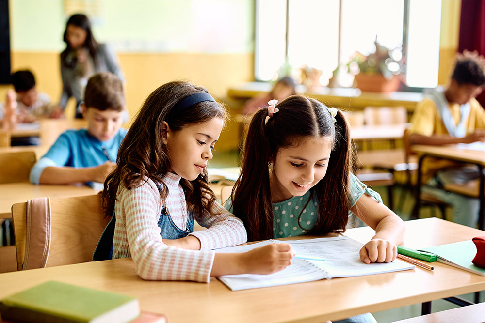 A student engaged in classroom learning