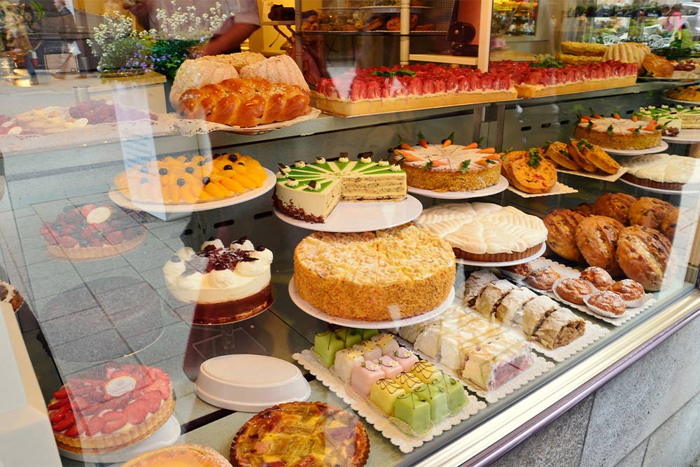 cakes displayed on the shelf 