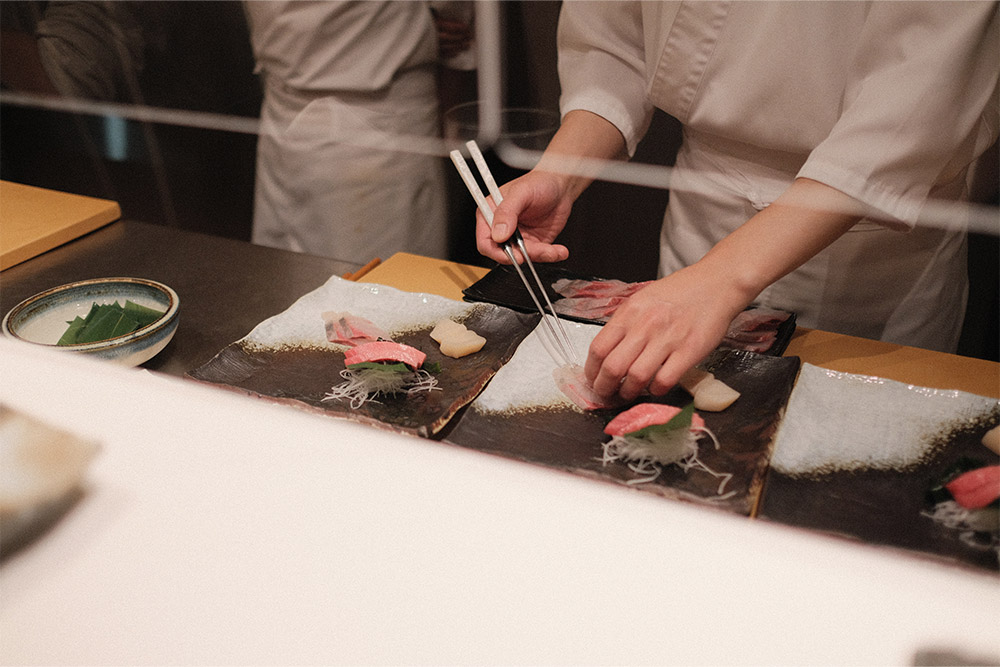 Chef making sushi in a Japanese restaurant 