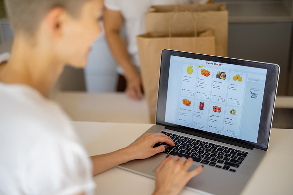 A woman buying groceries online 