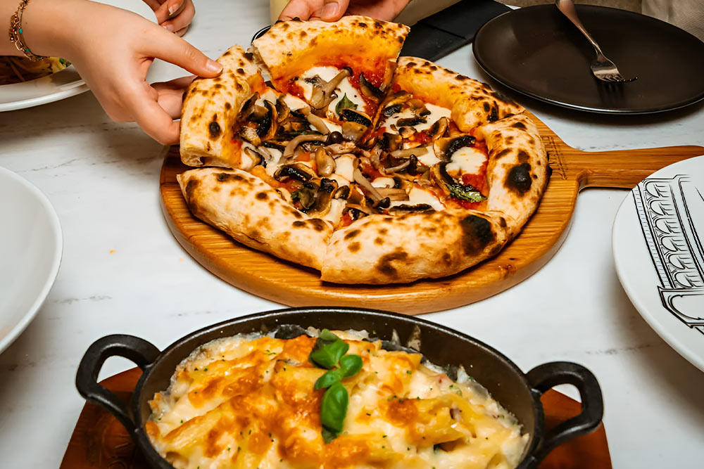 pizza served at a restaurant near dubai opera