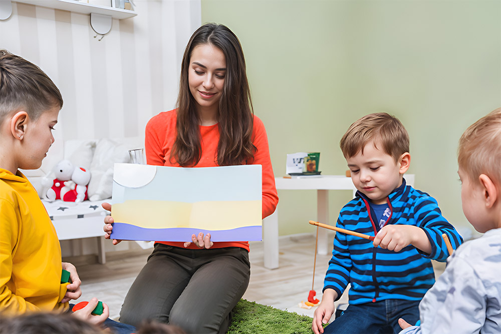 Teacher with children in a preschool