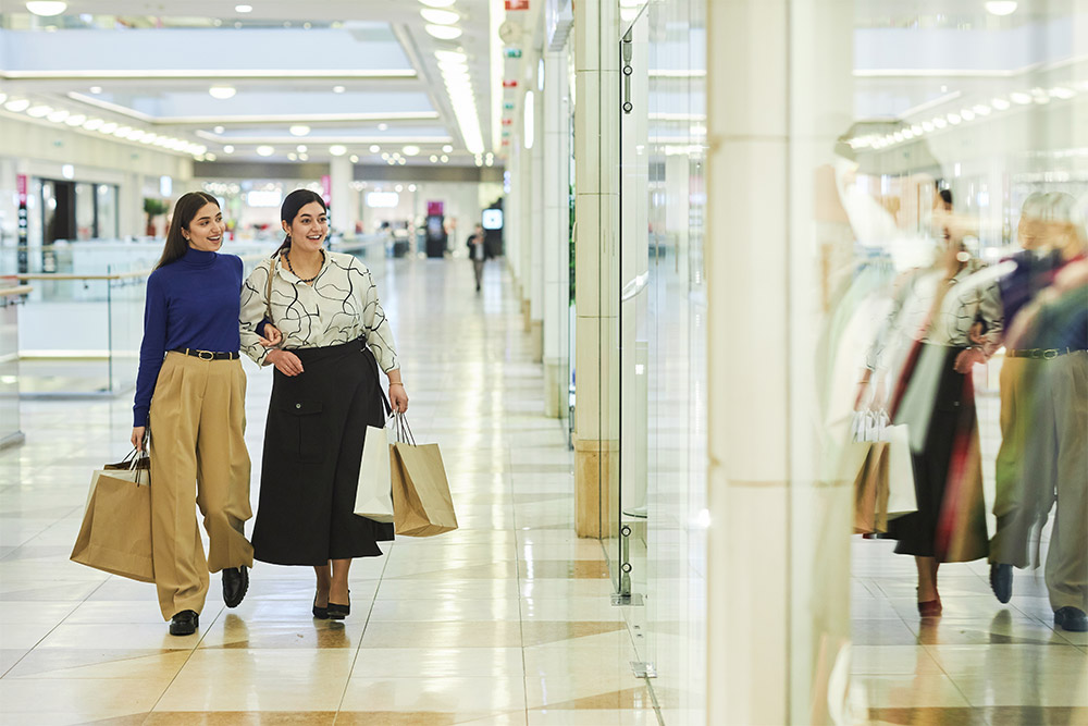 Two Girls Shopping in a Mall