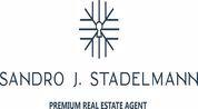 STADELMANN REAL ESTATE L.L.C logo image