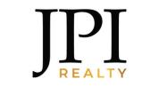 J P I REALTY logo image