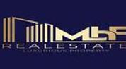 M B F real estate logo image