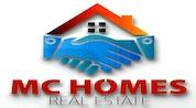 M C Homes Real Estate logo image