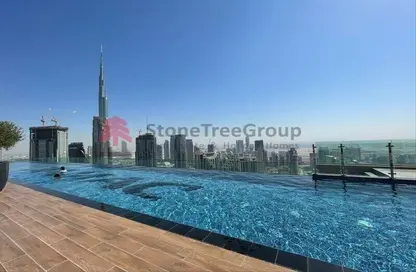 Pool image for: Apartment - 2 Bedrooms - 2 Bathrooms for rent in Paramount Tower Hotel  and  Residences - Business Bay - Dubai, Image 1