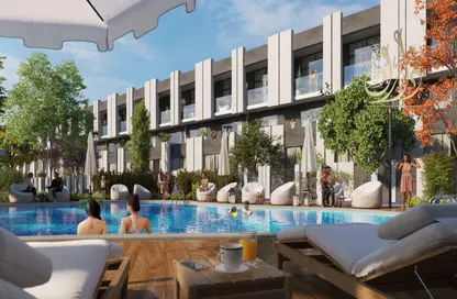 Townhouse - 2 Bedrooms - 3 Bathrooms for sale in Reportage Village 1 - Dubai Land - Dubai