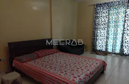 Apartment - Studio - 1 Bathroom for rent in EMR 05 - Emirates Cluster - International City - Dubai