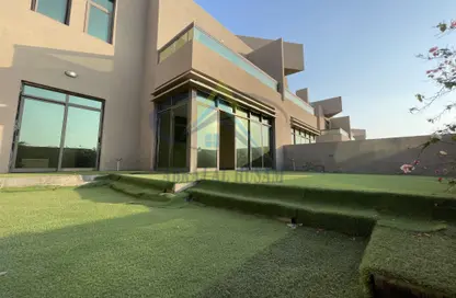 Garden image for: Compound - 4 Bedrooms - 6 Bathrooms for rent in Khalifa City A Villas - Khalifa City A - Khalifa City - Abu Dhabi, Image 1