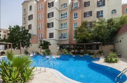 Pool image for: Apartment - 1 Bedroom - 2 Bathrooms for sale in Building 38 to Building 107 - Mediterranean Cluster - Discovery Gardens - Dubai, Image 1