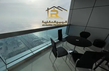 Apartment - 1 Bedroom - 2 Bathrooms for sale in Corniche Tower - Ajman Corniche Road - Ajman