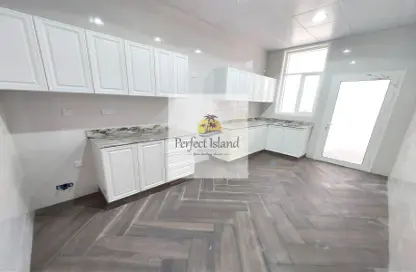 Kitchen image for: Apartment - 3 Bedrooms - 4 Bathrooms for rent in Al Shawamekh - Abu Dhabi, Image 1