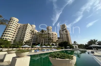 Pool image for: Apartment - 1 Bedroom - 2 Bathrooms for sale in Al Hamra Palace Beach Resort - Al Hamra Village - Ras Al Khaimah, Image 1