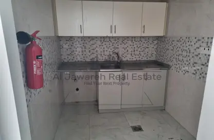 Apartment - 1 Bathroom for sale in Al Ghoroub Tower - Al Alia - Ajman