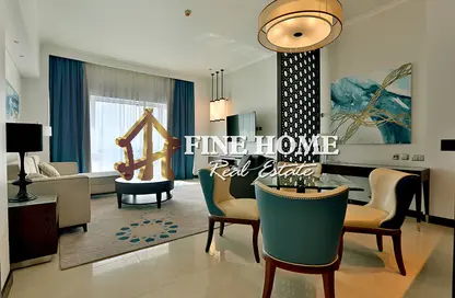 Living / Dining Room image for: Apartment - 1 Bedroom - 2 Bathrooms for rent in Fairmont Marina Residences - The Marina - Abu Dhabi, Image 1