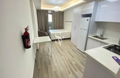 Apartment - 1 Bathroom for rent in Laya Mansion - Jumeirah Village Circle - Dubai