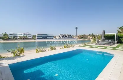 Villa - 5 Bedrooms - 6 Bathrooms for rent in Garden Homes Frond E - Garden Homes - Palm Jumeirah - Dubai