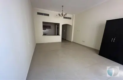 Apartment - 1 Bathroom for rent in Trafalgar Tower - CBD (Central Business District) - International City - Dubai