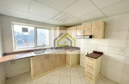 صورة لـ مطبخ شقة - 2 غرف نوم - 2 حمامات للايجار في برج الجوهرة 1 - النهدة - الشارقة ، صورة رقم 1
