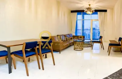 Living / Dining Room image for: Apartment - 3 Bedrooms - 4 Bathrooms for sale in Bayz by Danube - Business Bay - Dubai, Image 1