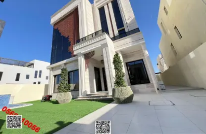 Villa - 5 Bedrooms - 7 Bathrooms for sale in Ajman Hills - Al Alia - Ajman