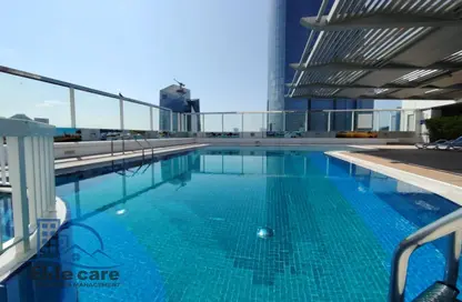 Apartment - 3 Bedrooms - 3 Bathrooms for rent in Golden Falcon Tower - Hamdan Street - Abu Dhabi